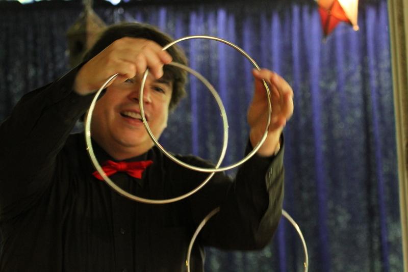 Magician Olivier OK MAGICS with Linking Rings in Belgium 2014
