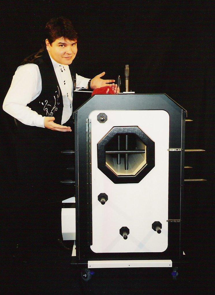 Magician Olivier OK MAGICS with Octocubus grand illusion