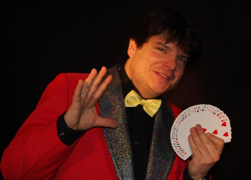Magician Olivier OK MAGICS with card fan