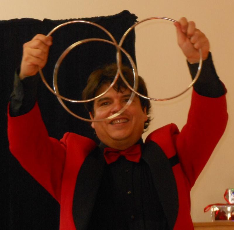 Magicican Olivier OK MAGICS performing Linking Rings in Bourgogne France 2012