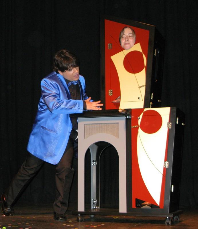 Magician Olivier OK MAGICS performing Modern Art Illusion Jubilée Show Brussels 2010