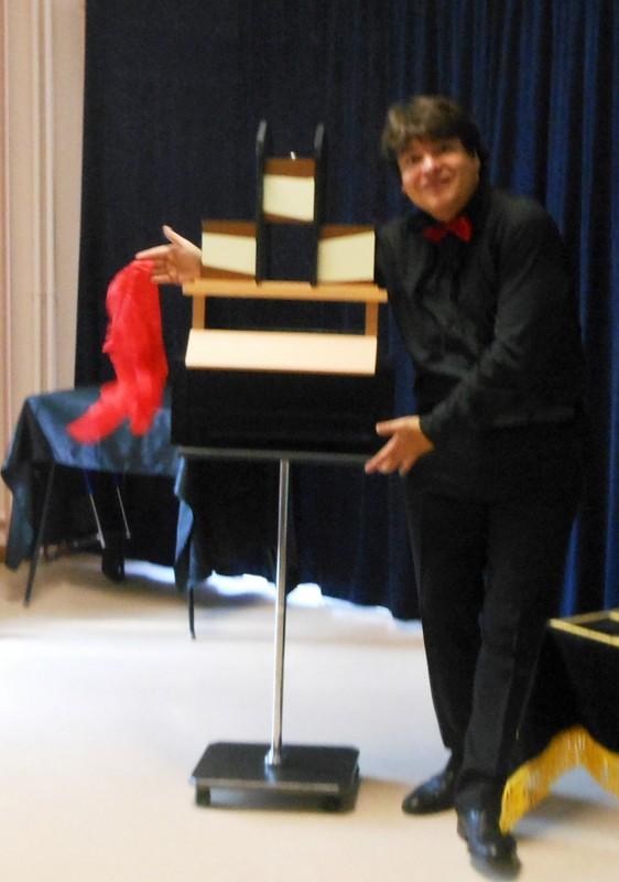 Magician Olivier OK MAGICS performing Trisection Illusion in Bourgogne France 2012